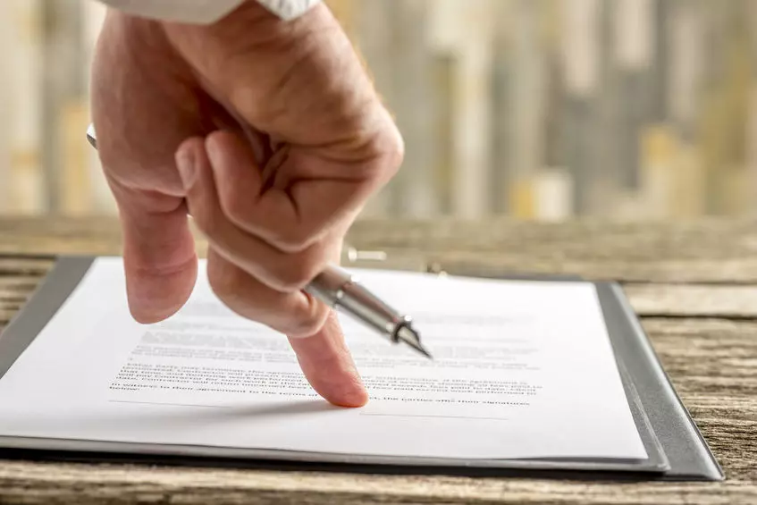 Family meeting with legal advisor, showing when a Will is crucial—highlighting Trusted Will Writing Ipswich for essential life planning.